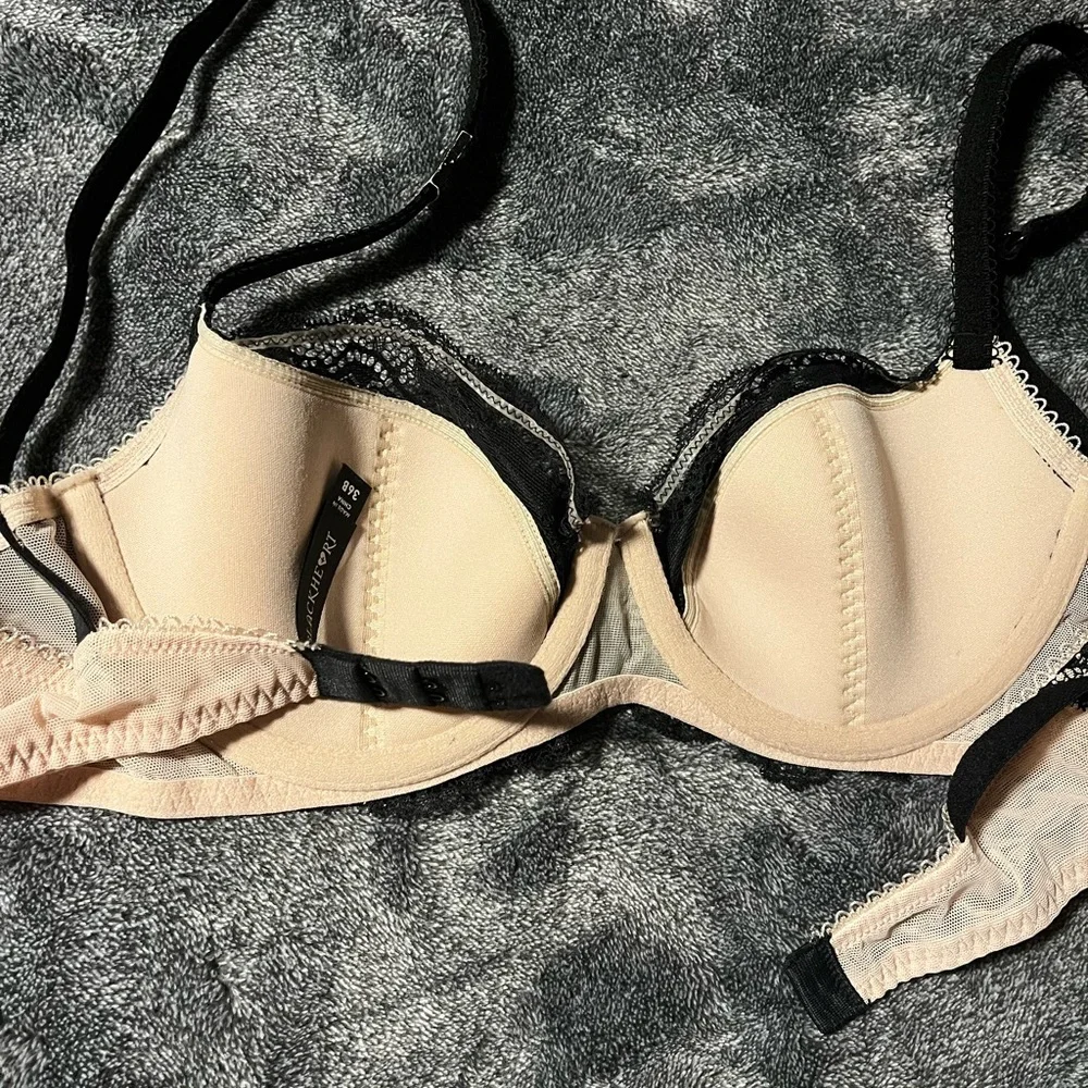BLACKHEART bra new with partial tags.  Black and nude color. Underwire. 36B